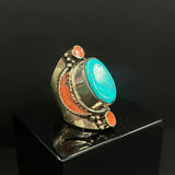 Chunky handcrafted Nepalese rings featuring turquoise stones and detailed silver work