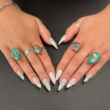 Small handcrafted Nepalese silver rings with turquoise stones, ethical artisan jewellery