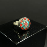 Delicate Nepalese silver rings with turquoise stones, handmade by artisans