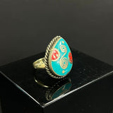 Ethical small Nepalese rings in handcrafted silver with turquoise detail
