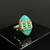 Delicate Nepalese silver rings with turquoise stones, handmade by artisans