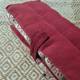 red meditation pillow